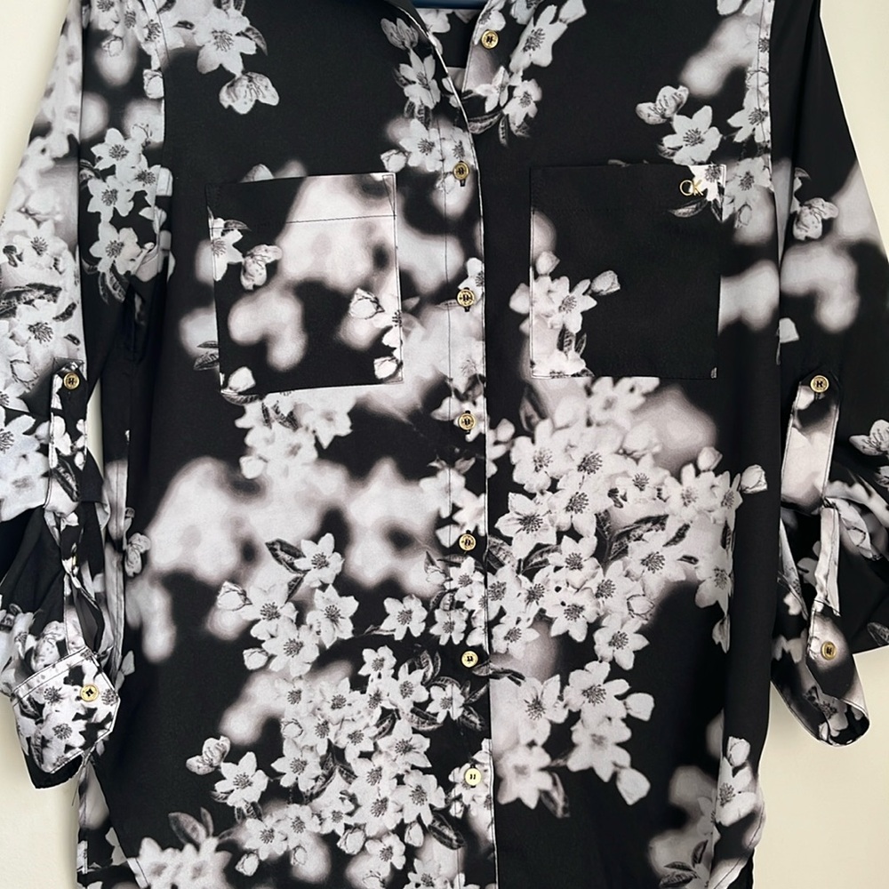 Calvin Klein Women’s Black And White Flower Blouse.